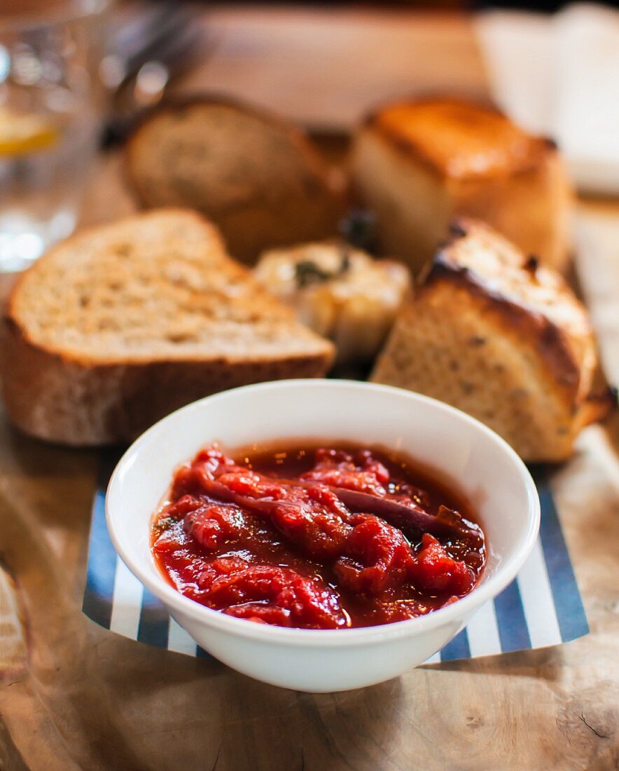A tomato and peptide dip served with grilled bread