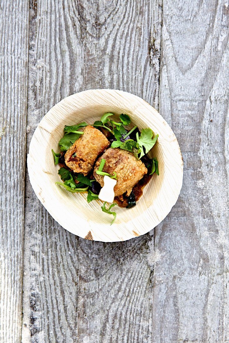 Fried pork belly with aubergine and coriander (Asia)