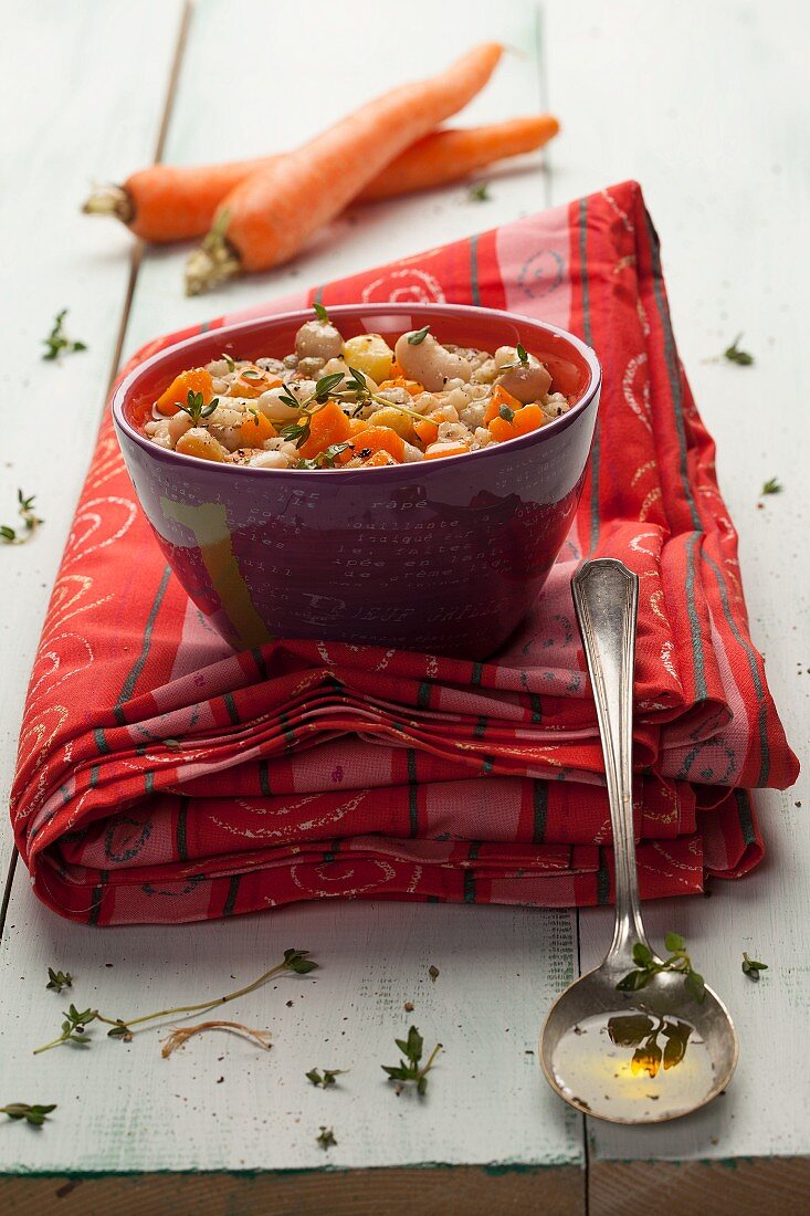 Rustic bean soup with carrot and chickpeas