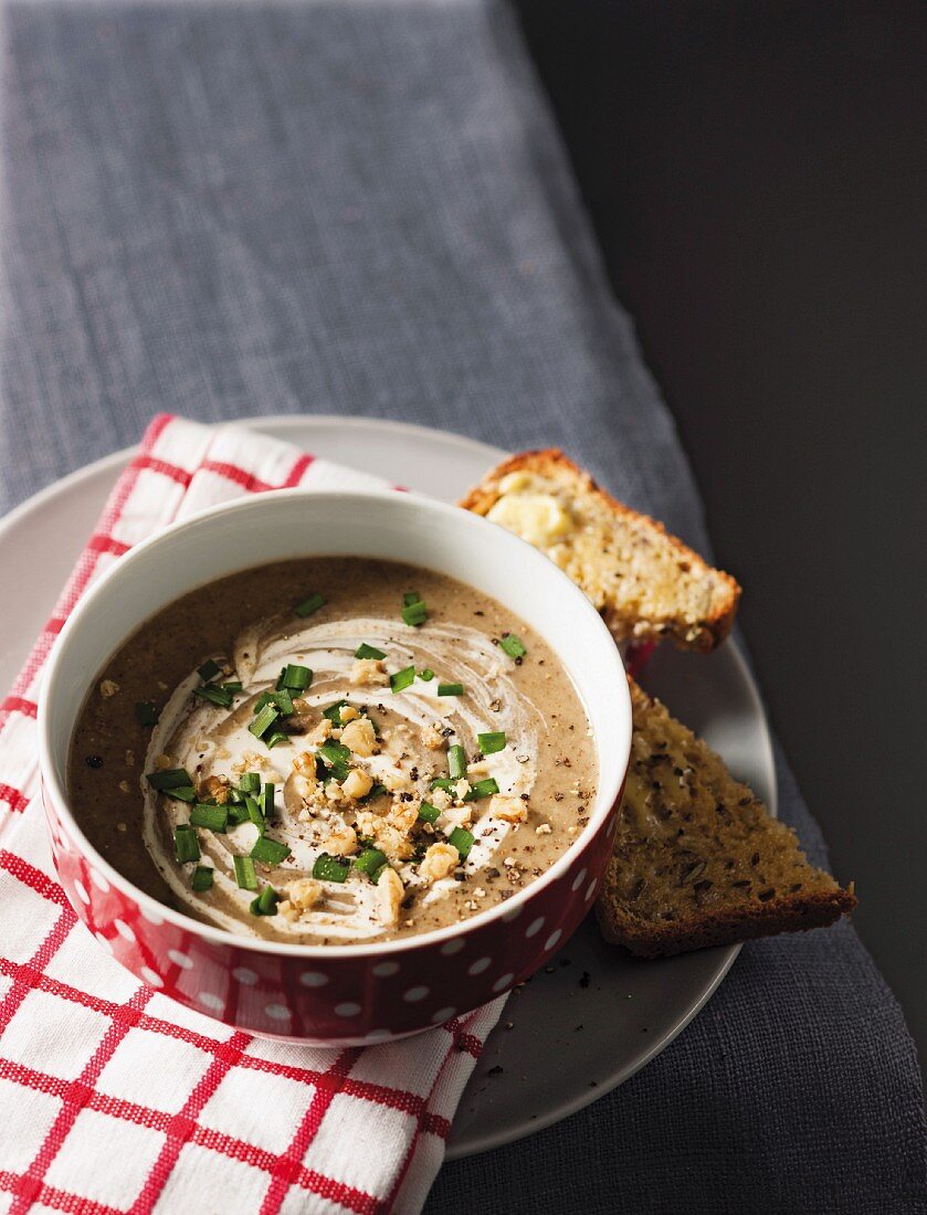 Cream of mushroom consommé soup