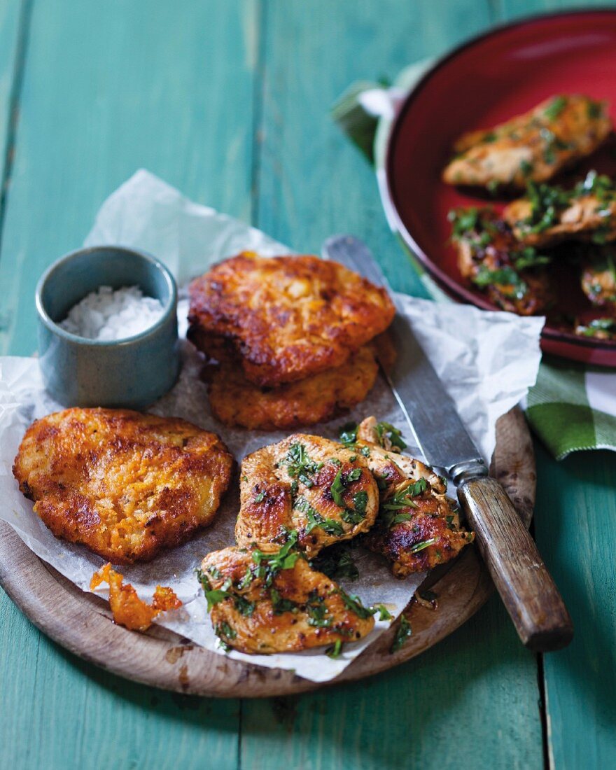 Spicy chicken medallions with sweet potato fritters