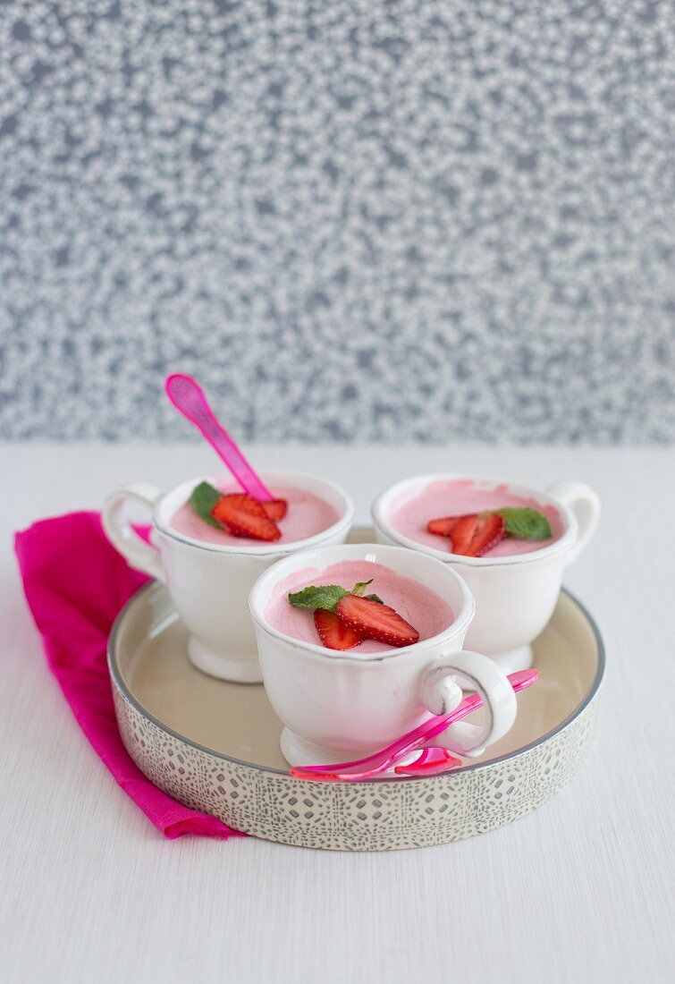Three cups of strawberry mousse