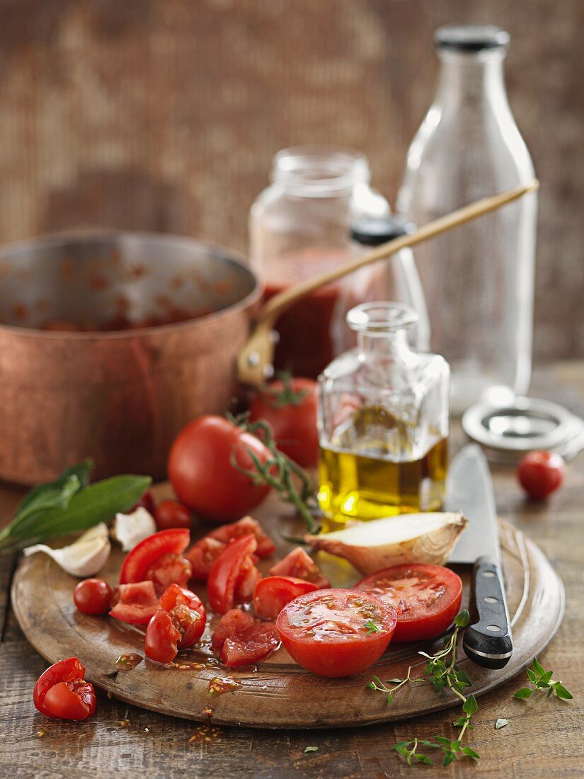 Tomatoes, sliced on a wooden board