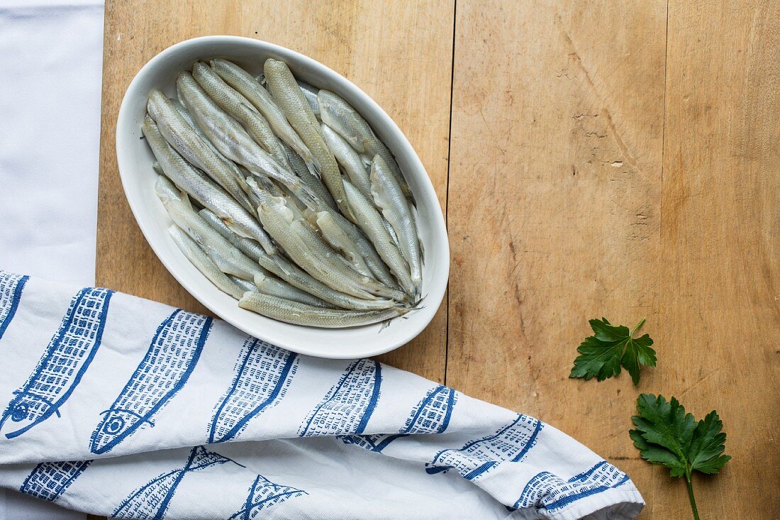 Fresh smelts in a ceramic bowl