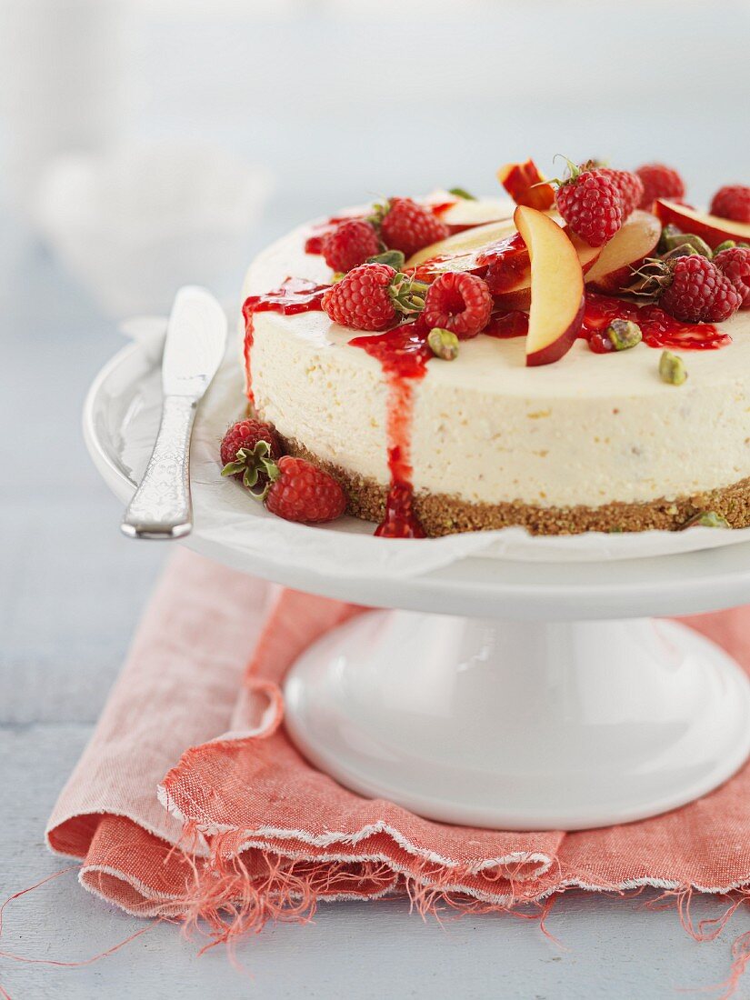 Cheesecake with fruit and pistachios