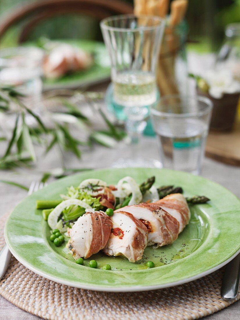 Chicken breast wrapped in Prosciutto with asparagus