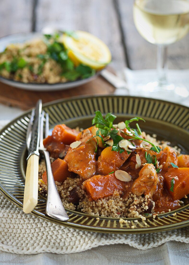 Chicken with apricots, flaked almonds and couscous