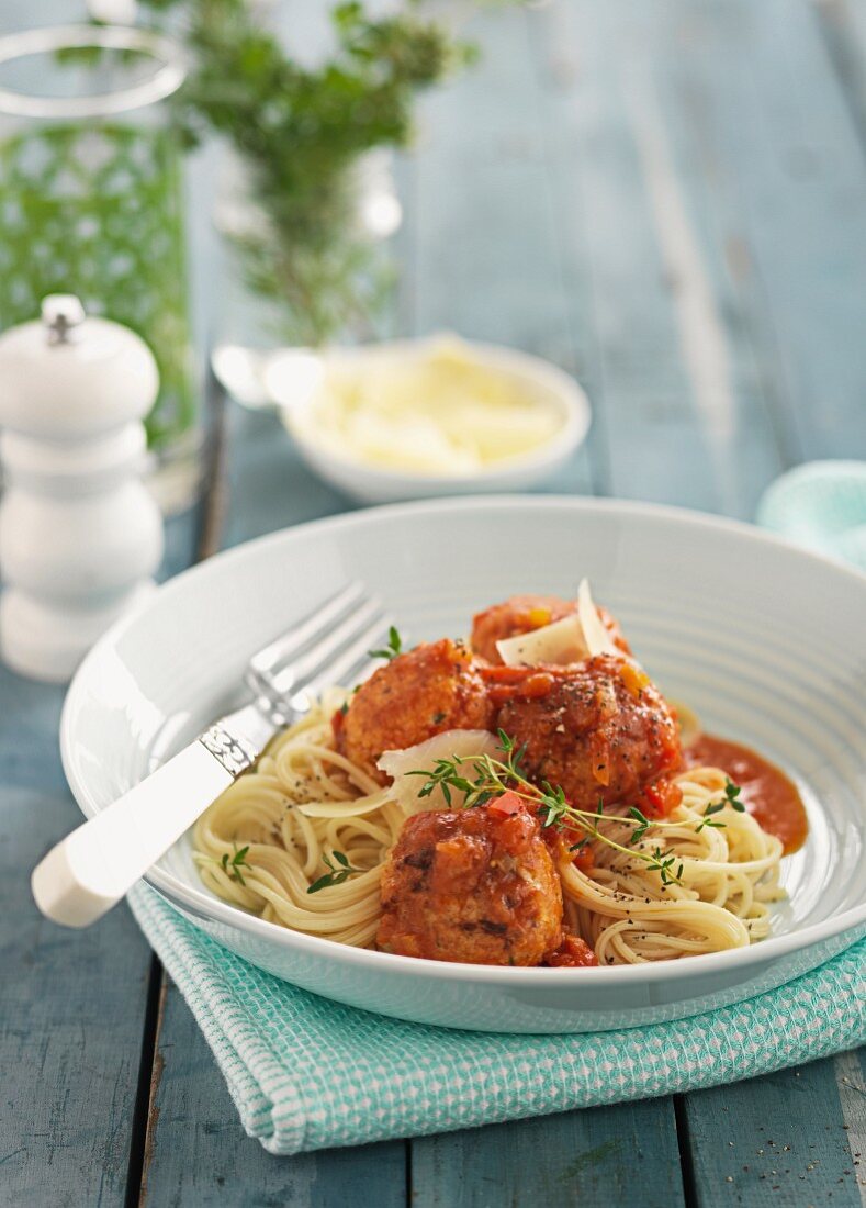 Chicken meatballs with tomato sauce and tagliatelle