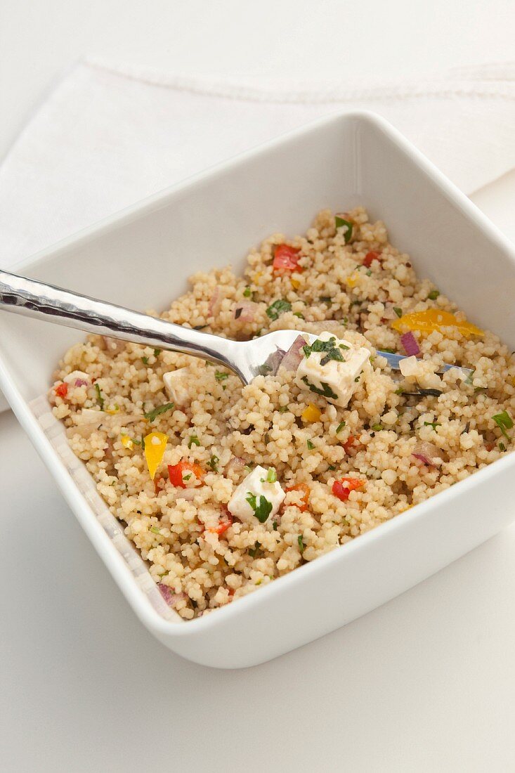 Couscous salad with peppers and feta cheese
