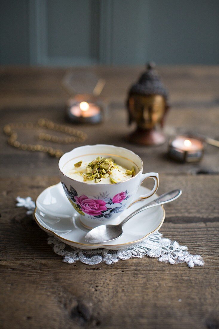 Mango kulfi (Indian ice cream) with pistachios