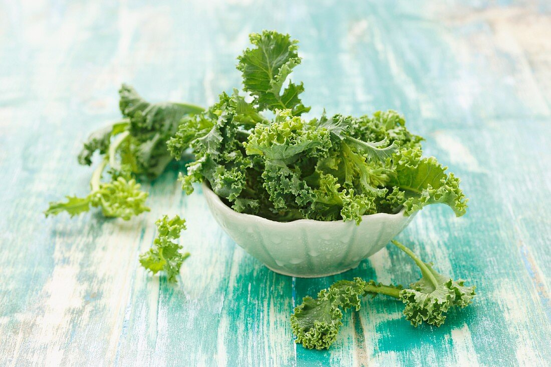 A bowl of young kale leaves