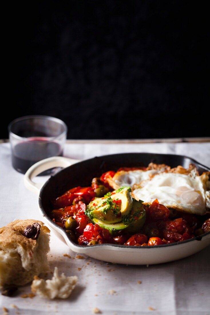 Baked tomato relish with a fried egg