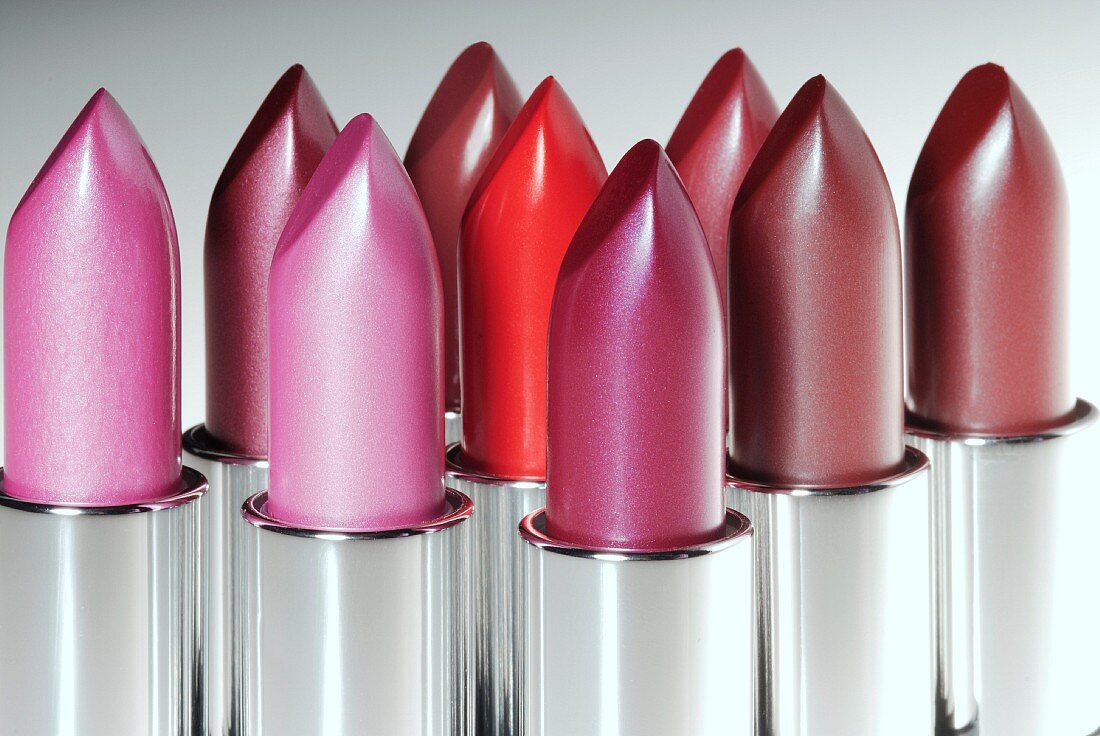 Various lipsticks in shades of red