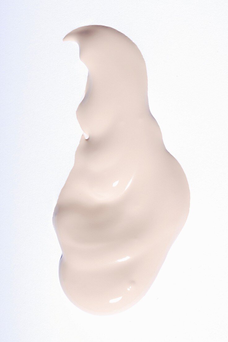 A dollop of make-up on a white surface