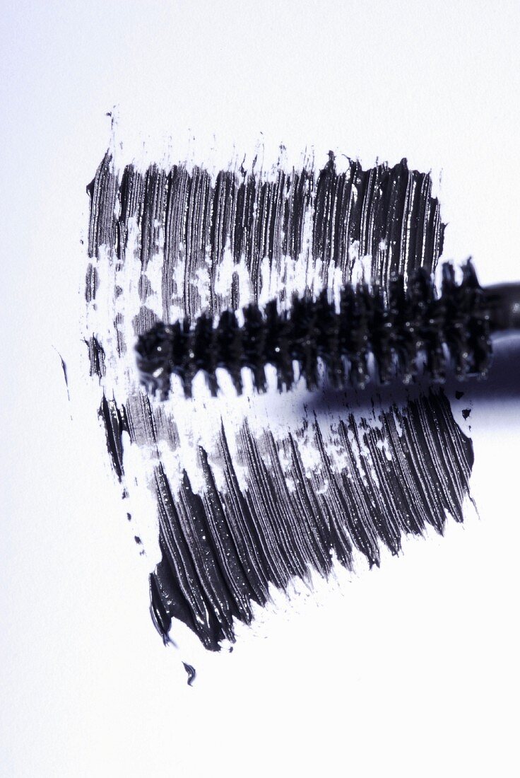 Black mascara on a white surface