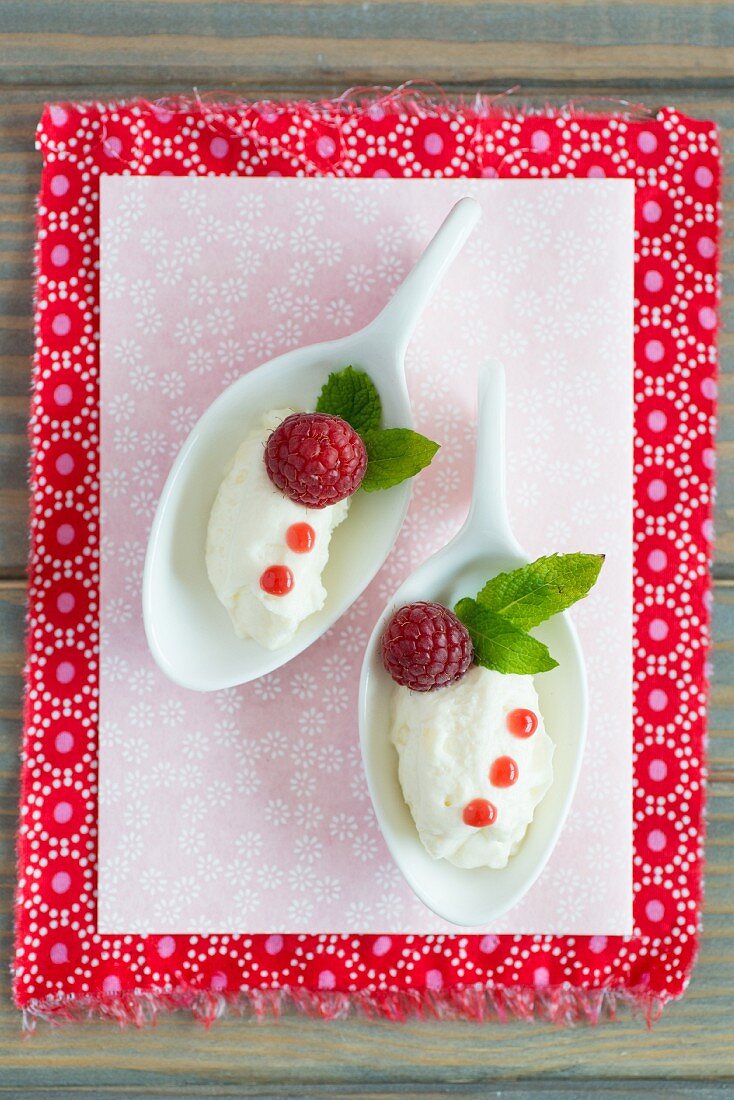 White chocolate mousse dumplings with raspberries and mint