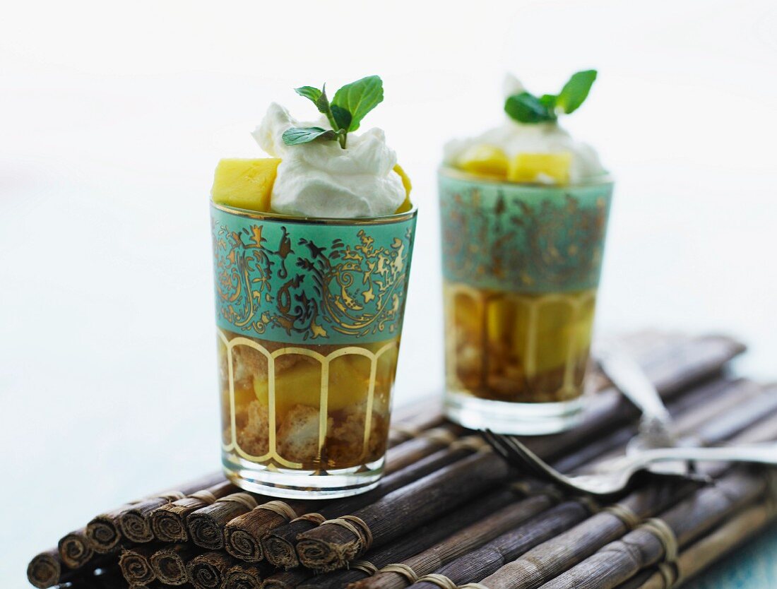 Pineapple dessert with cream and mint