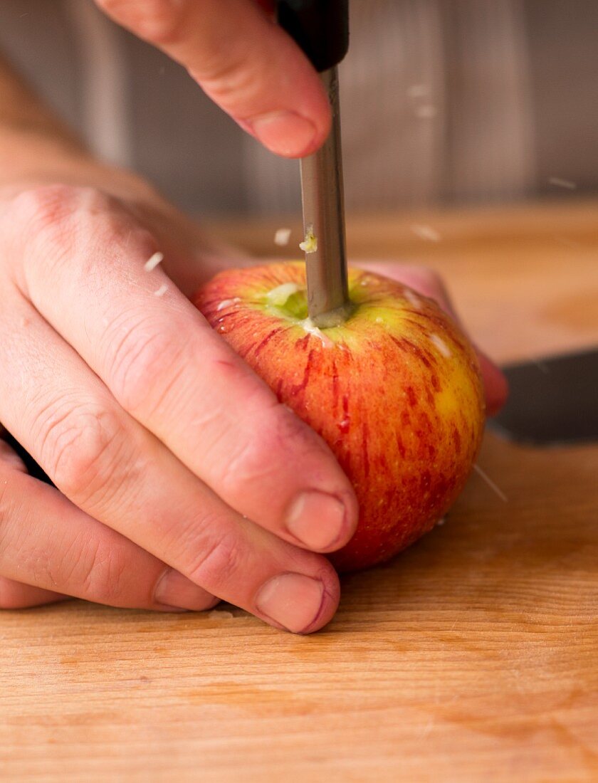 An apple being cored