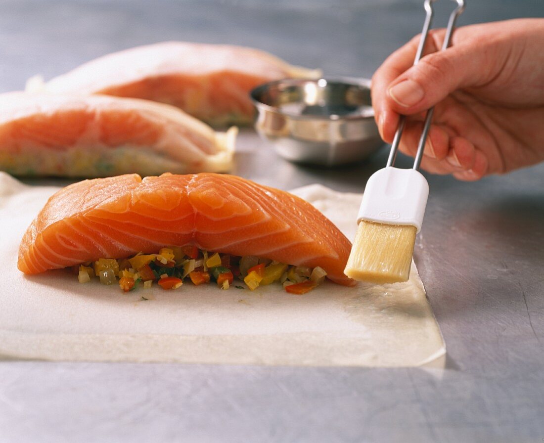 Salmon in filo pastry being made