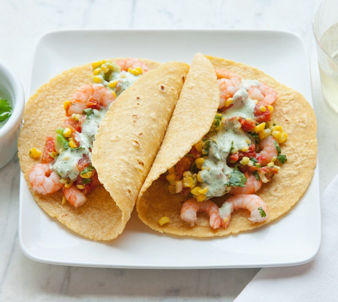 Tacos with prawns, sweetcorn and coriander