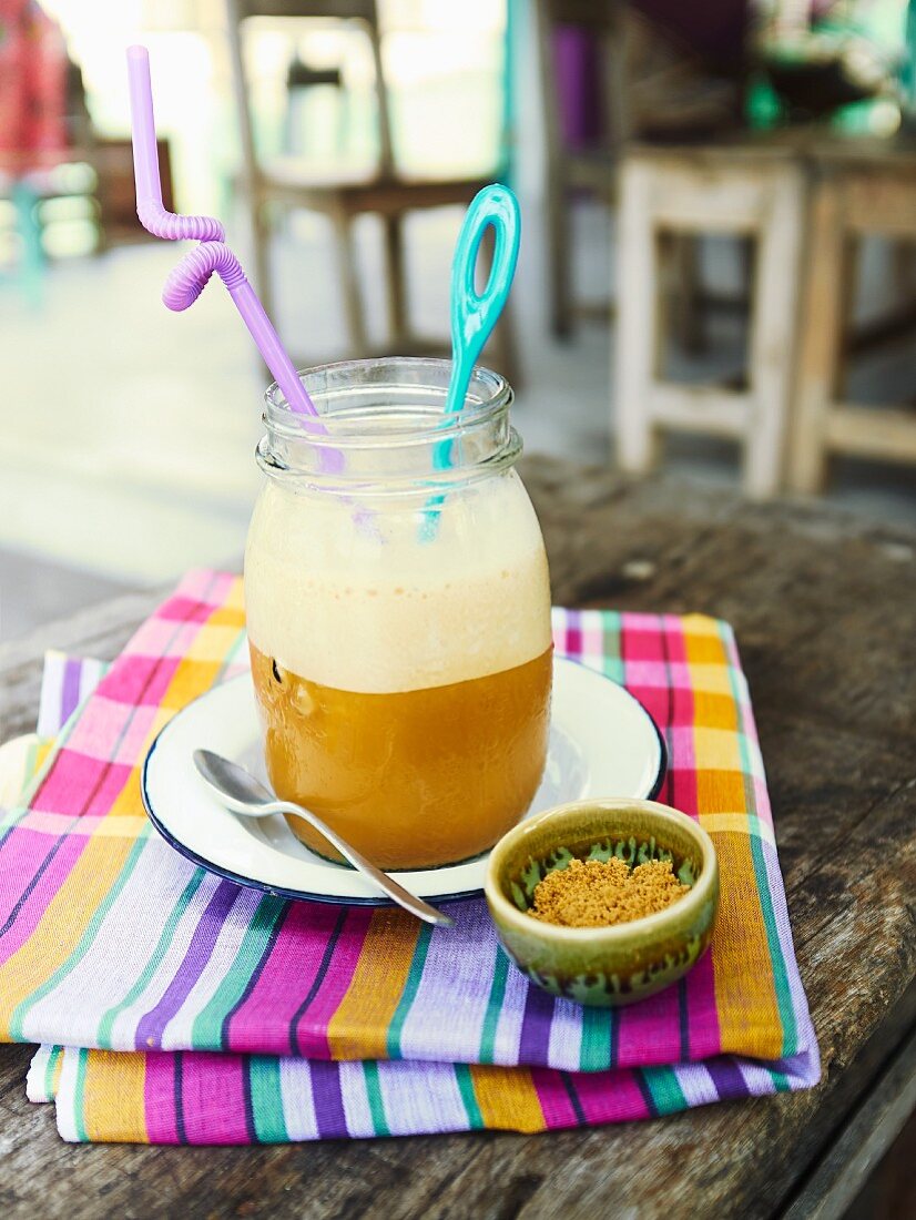 A coffee frappe on a restaurant table