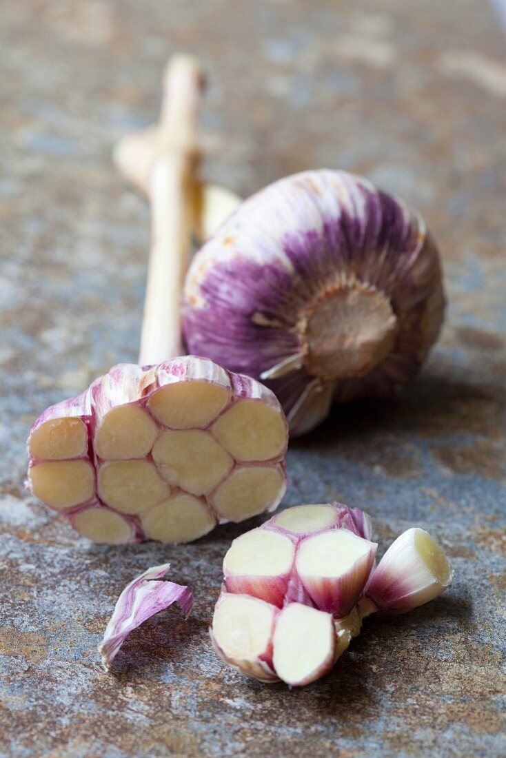 Fresh garlic, whole and sliced