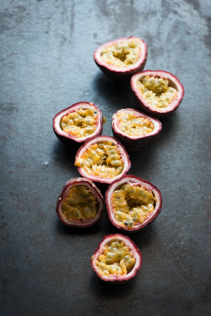 Red passion fruits, halved