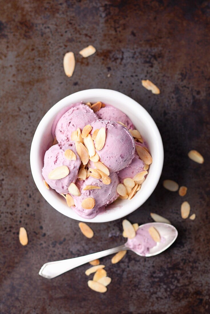 Blueberry ice cream with flaked almonds