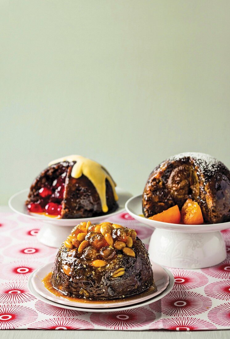 Three different Christmas puddings