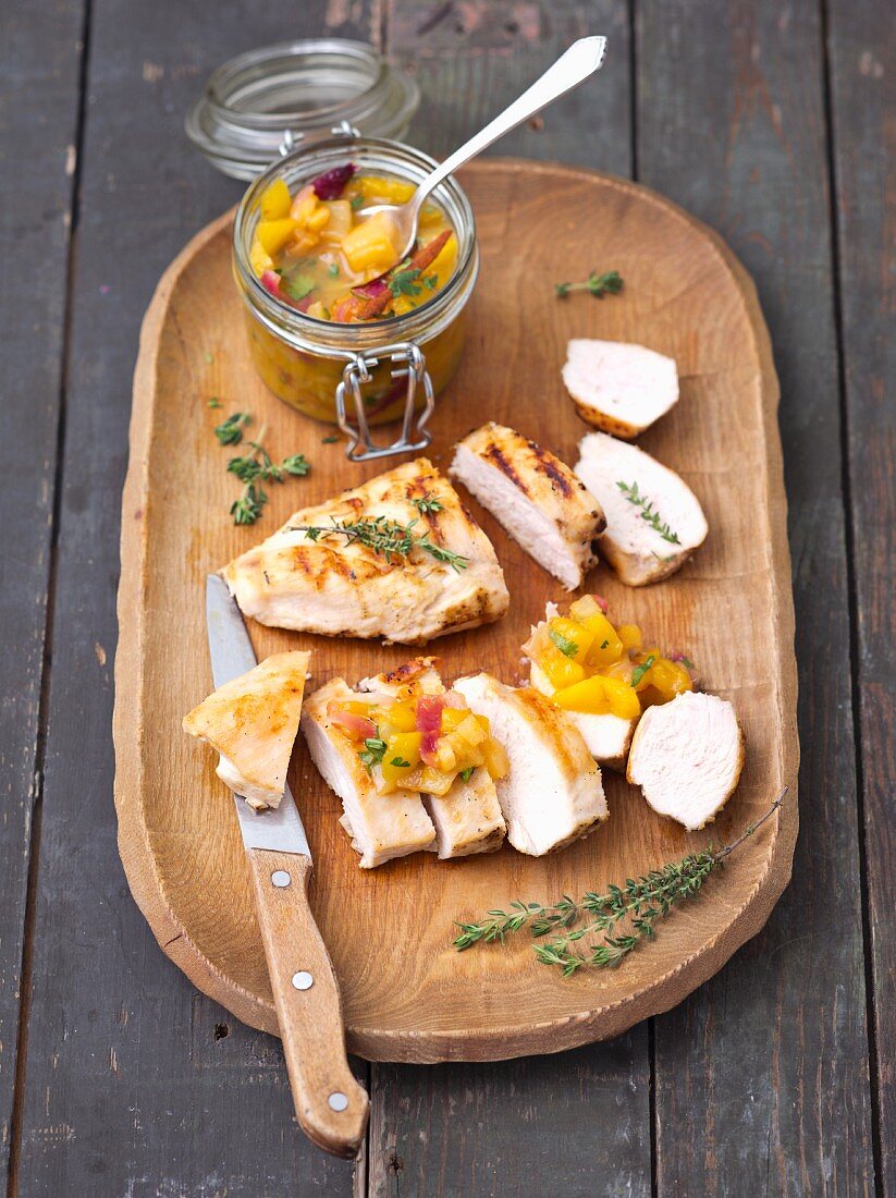 Grilled chicken breast with mango and pineapple chutney