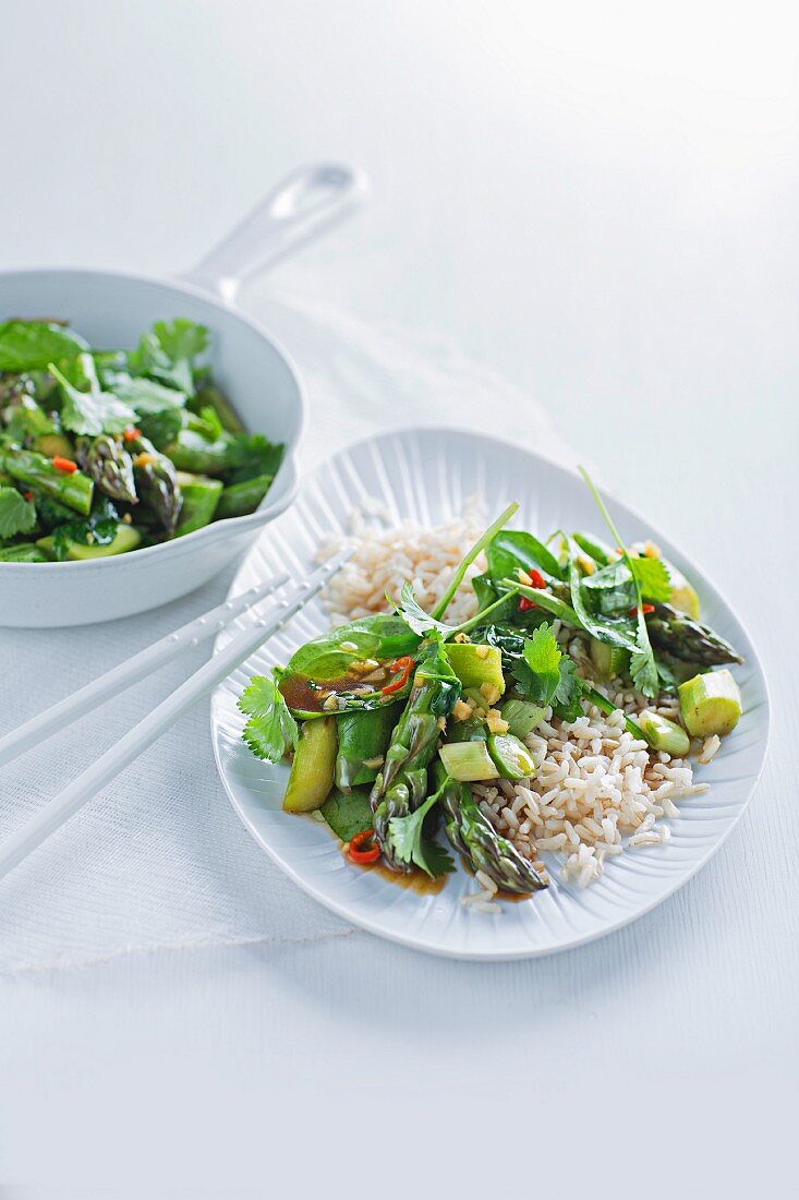 Asparagus and spinach medley on a bed of rice
