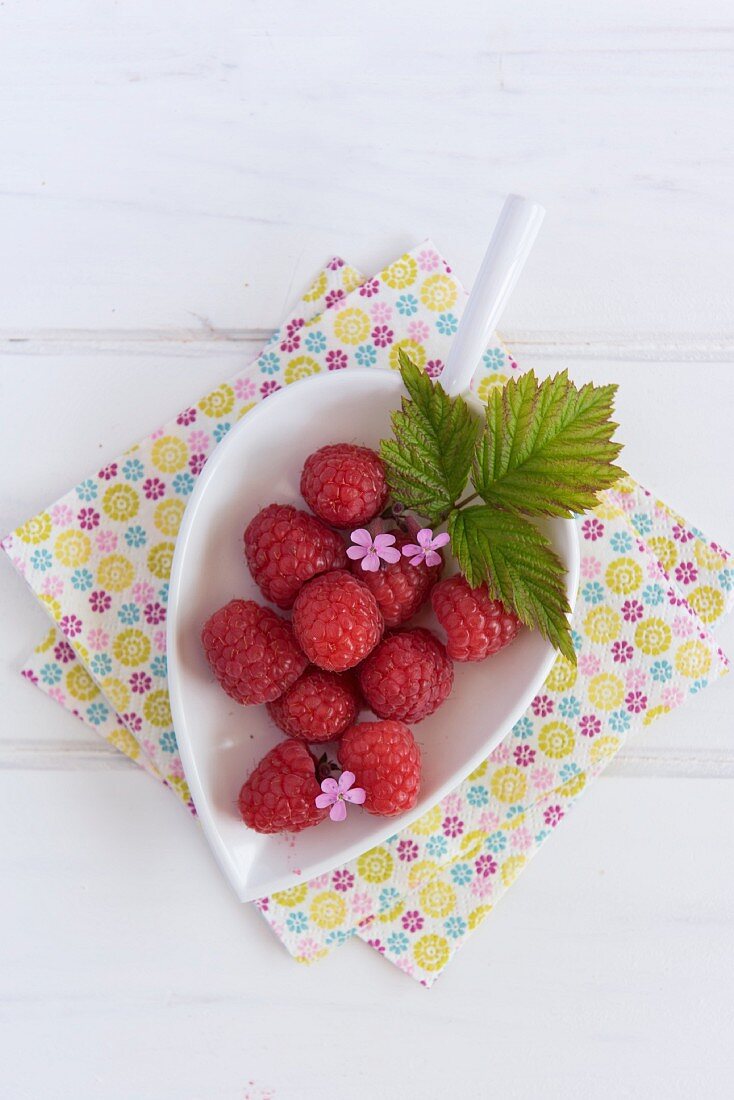 Raspberries in a small bowl