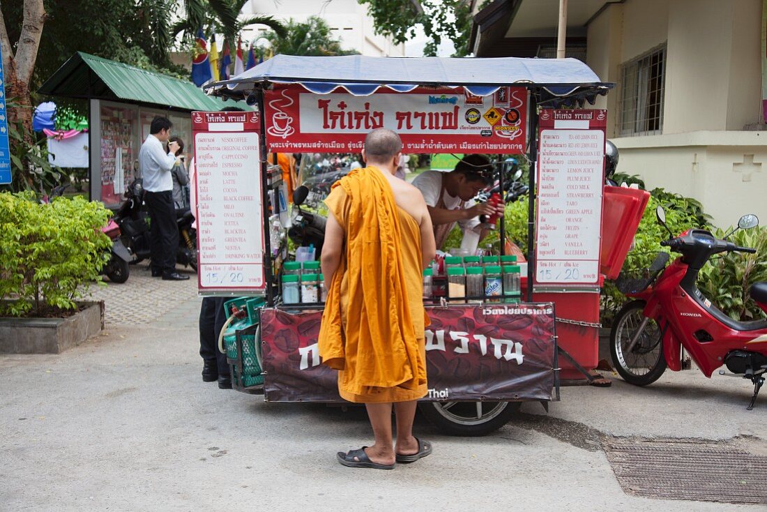 A Buddhist monk at a fast food stall