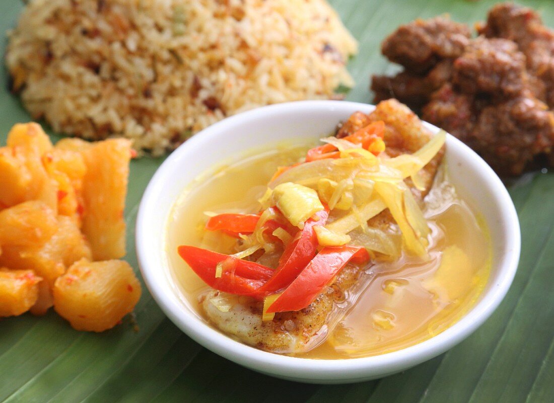 Nyonya cuisine: grouper fillet in a tamarind sauce (Malaysia)