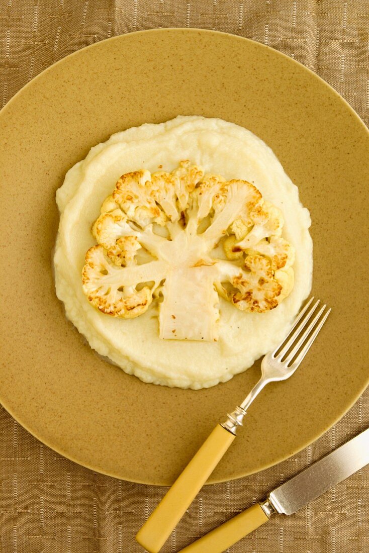 Grilled cauliflower on mashed potato