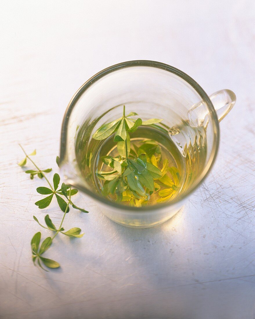 Woodruff in a jug of water and next to it