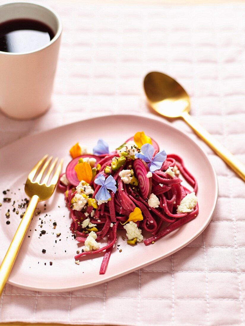 Beetroot tagliatelle with walnut brittle and ricotta