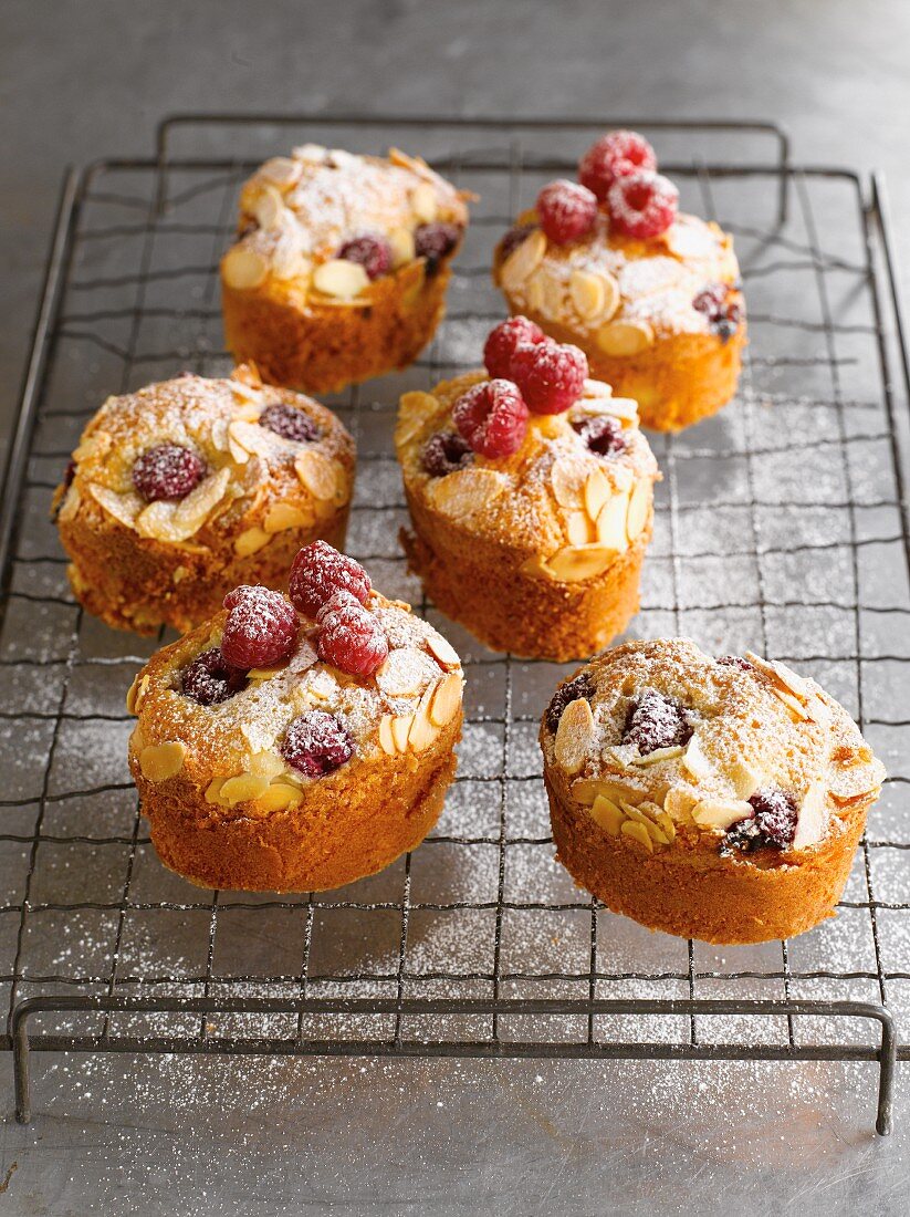 Raspberry muffins on a wire rack