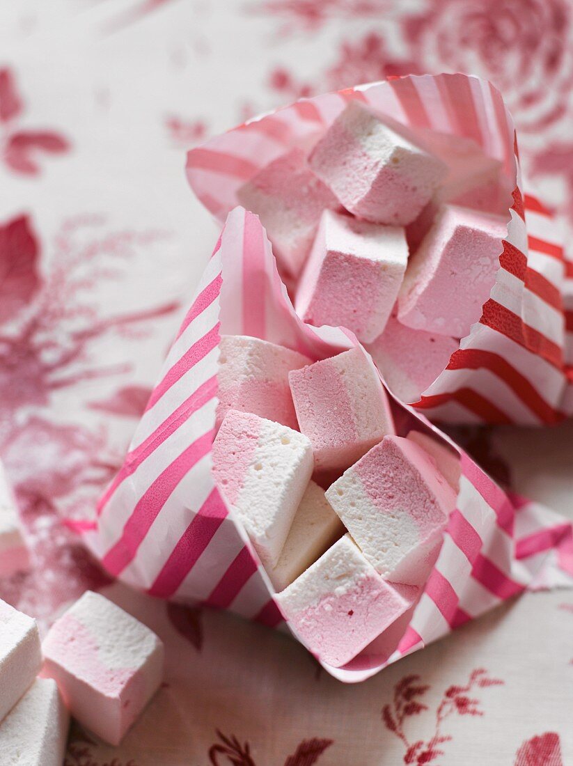 Pink-and-white marshmallows in bags as a gift