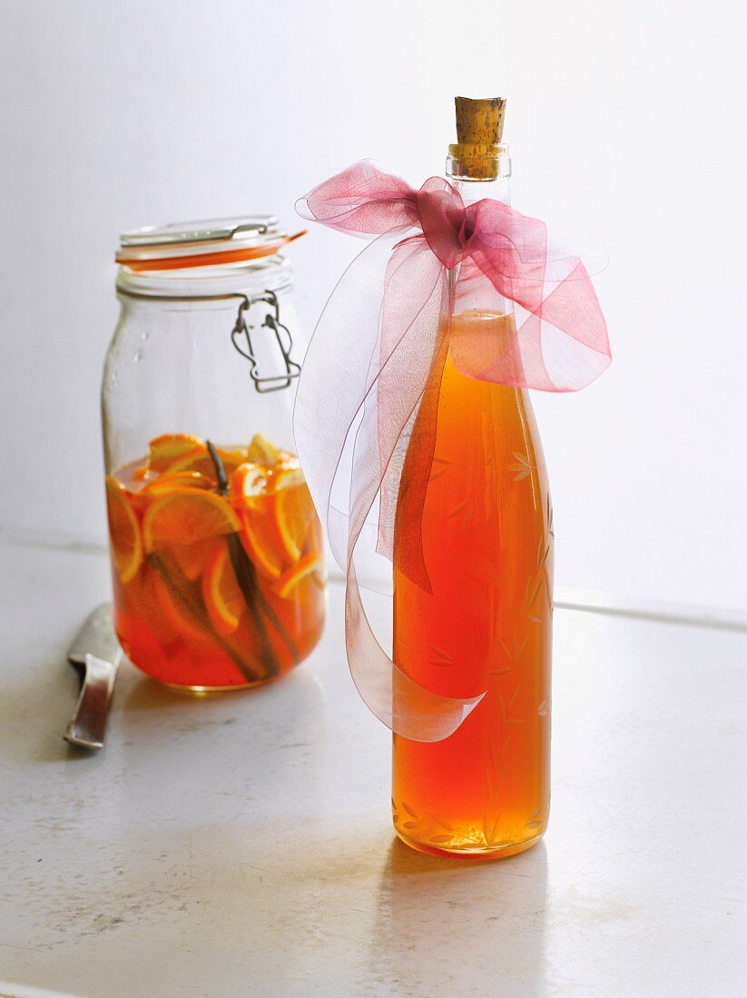Homemade orange liqueur with vanilla in a decorative bottle