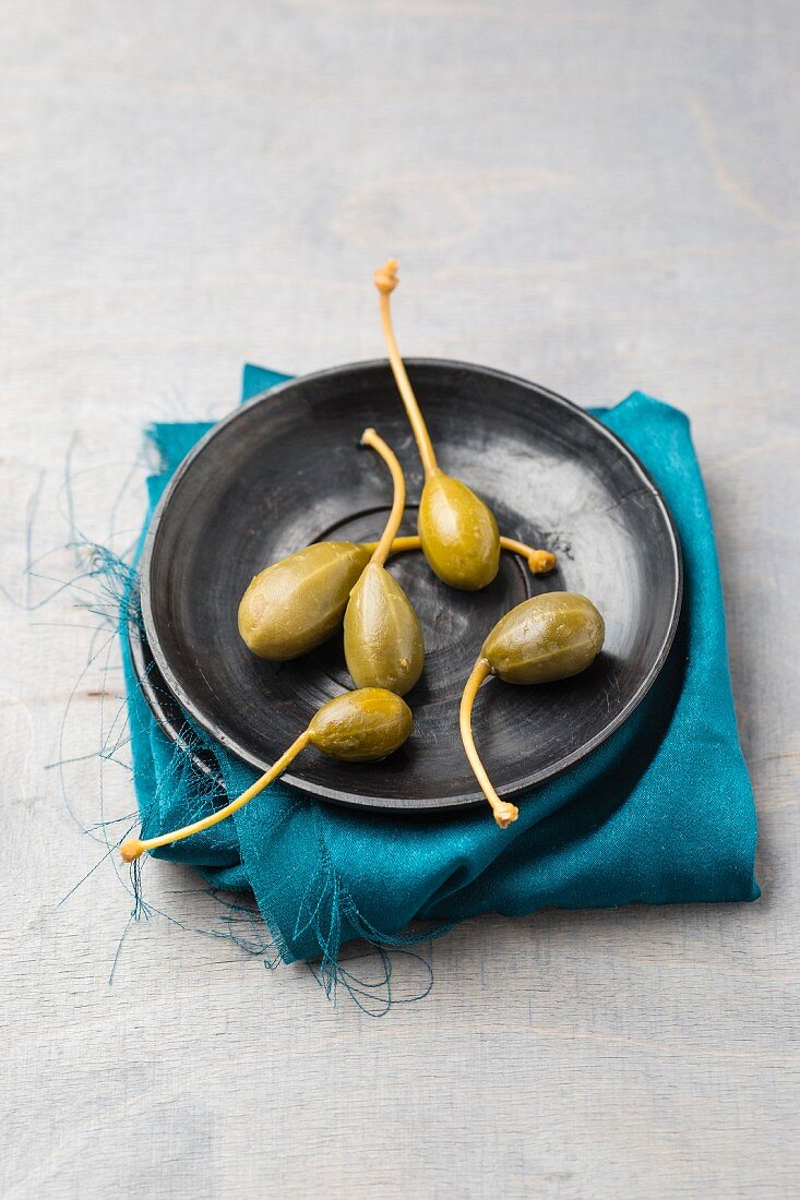 Caper fruits on a plate