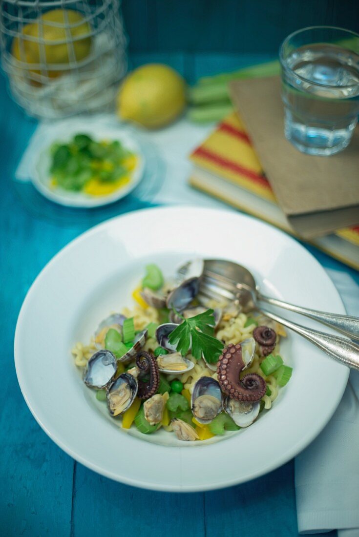 Fusilli lunghi bucati with squid, clams, peas, celery and yellow pepper
