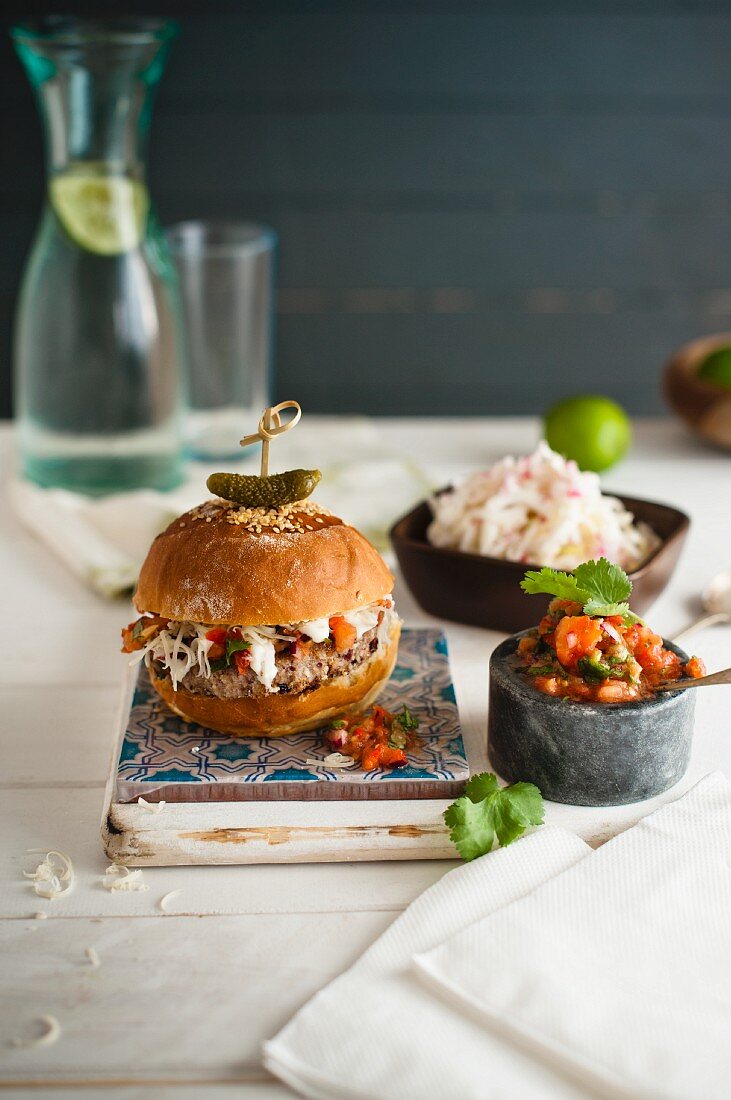 Moroccan lamb burger with mint yoghurt, coleslaw and spicy tomato relish