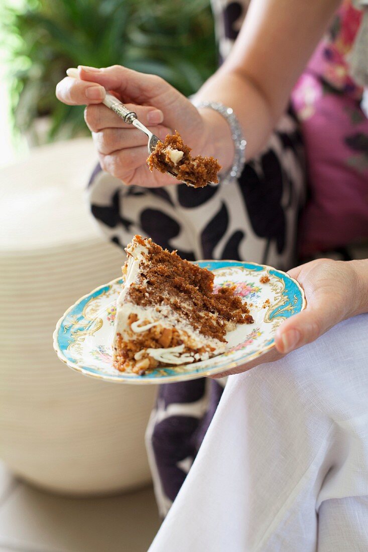 A slice of carrot and pineapple cake