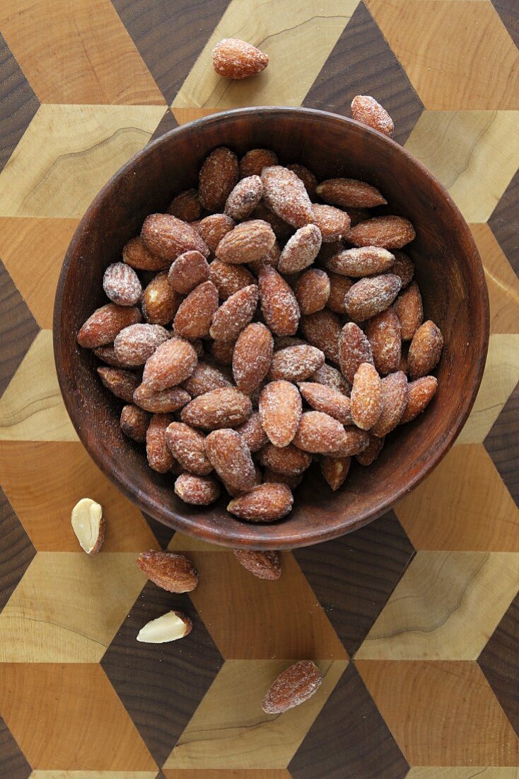 Roasted almonds in a wooden bowl