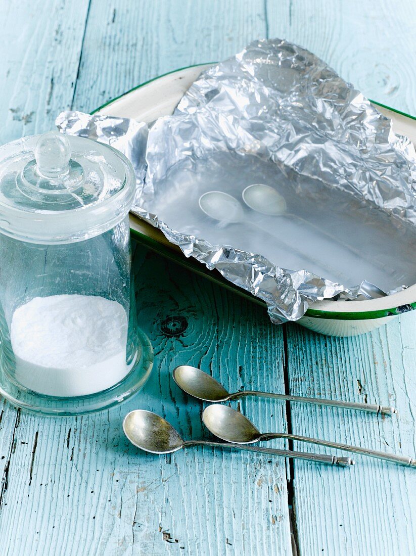 And old-fashioned way of cleaning silver with aluminium foil, boiling water and salt