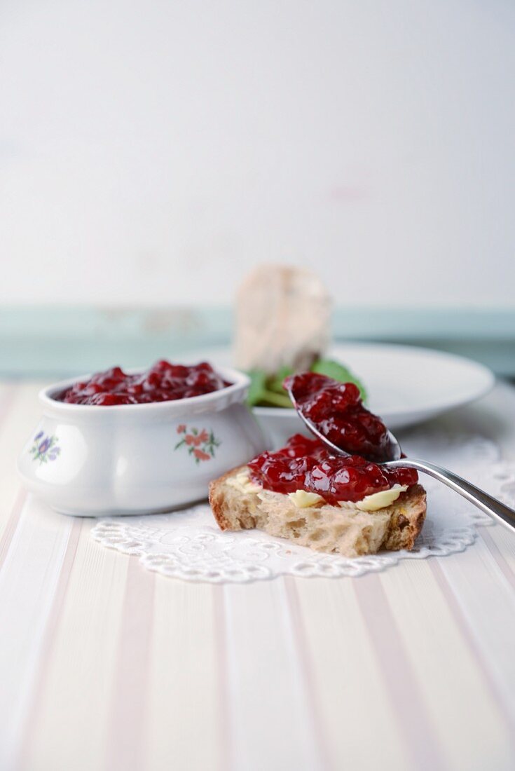 Bread with redcurrant jam