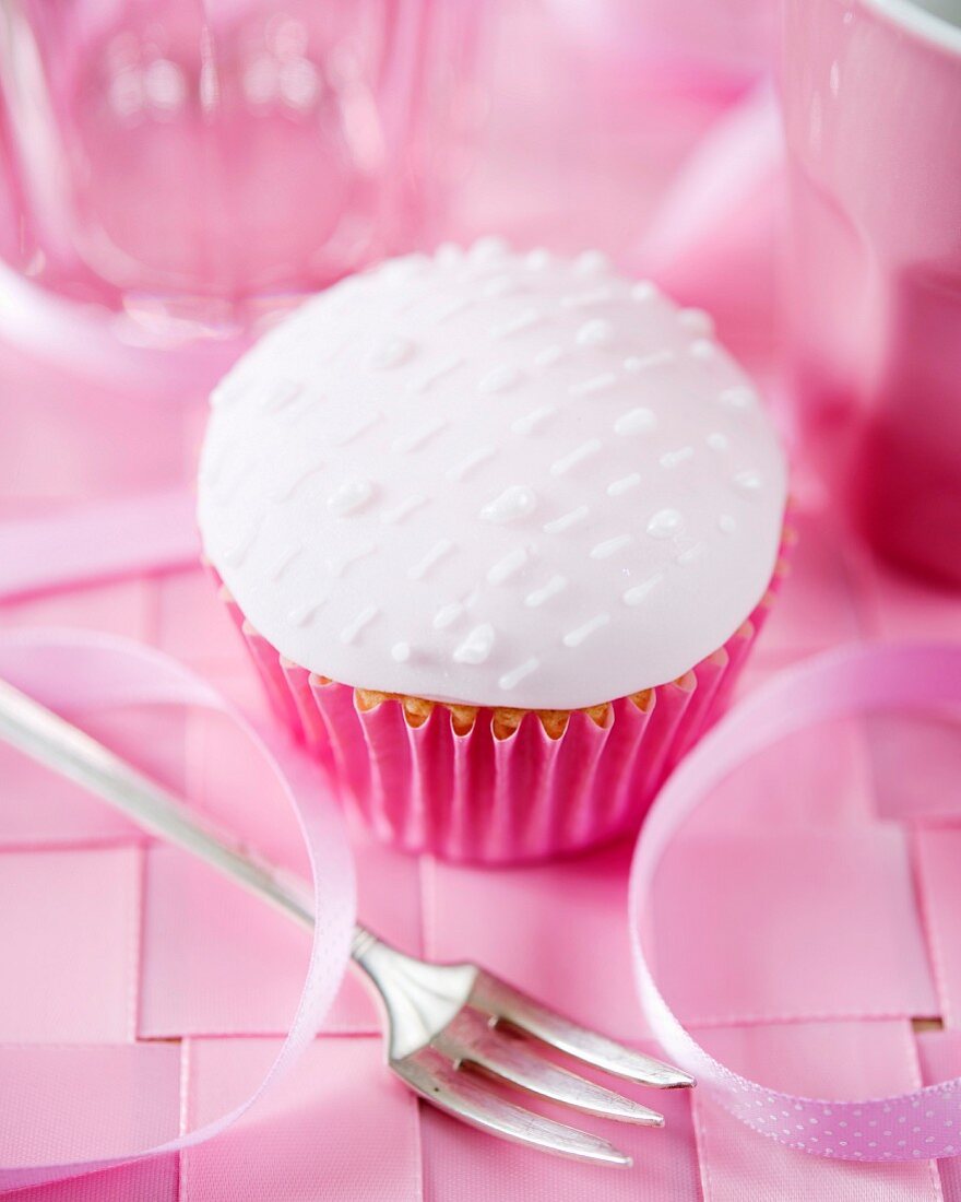 Cupcake mit weisser Fondantglasur