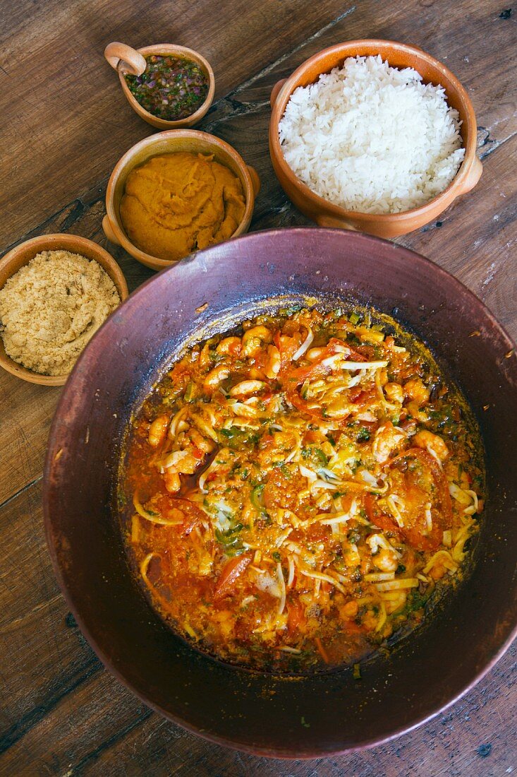 Seafood moqueca (traditional Bahian dish with vatapà, rice and manioc farofa, Brazil)