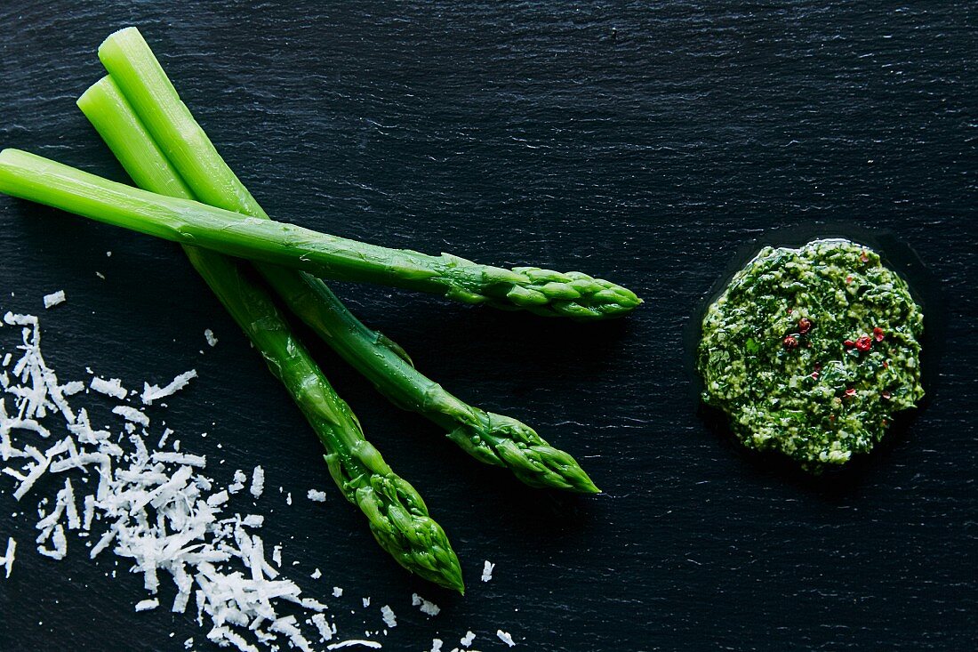 Blanched asparagus with coriander pesto and grated Parmesan